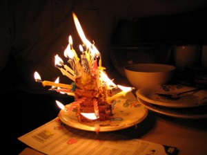 С тортом мы поспешили, и втыкать свечи пришлось в то, что осталось.